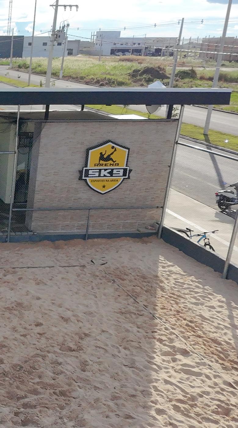 Escudo da arena na quadra